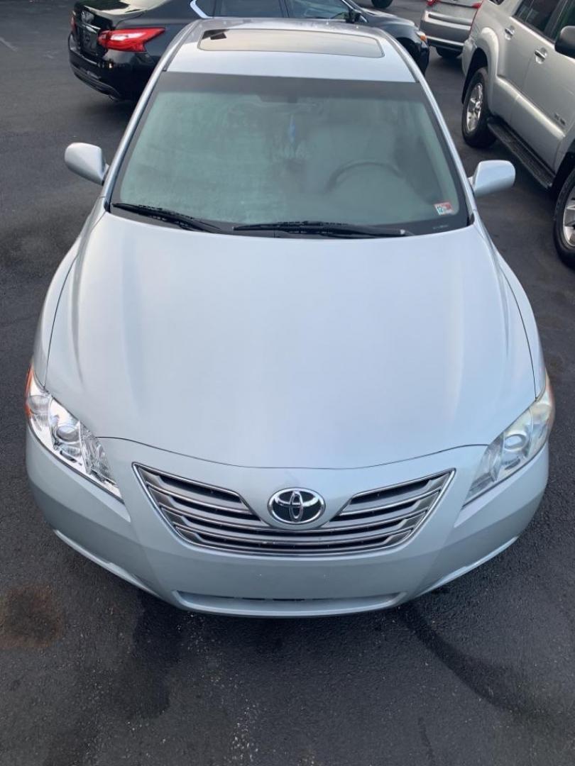 2007 SILVER TOYOTA CAMRY HYBRID (JTNBB46K273) with an 2.4L engine, Continuously Variable transmission, located at 2514 Williamson Rd NE, Roanoke, VA, 24012, (540) 265-7770, 37.294636, -79.936249 - Photo#2