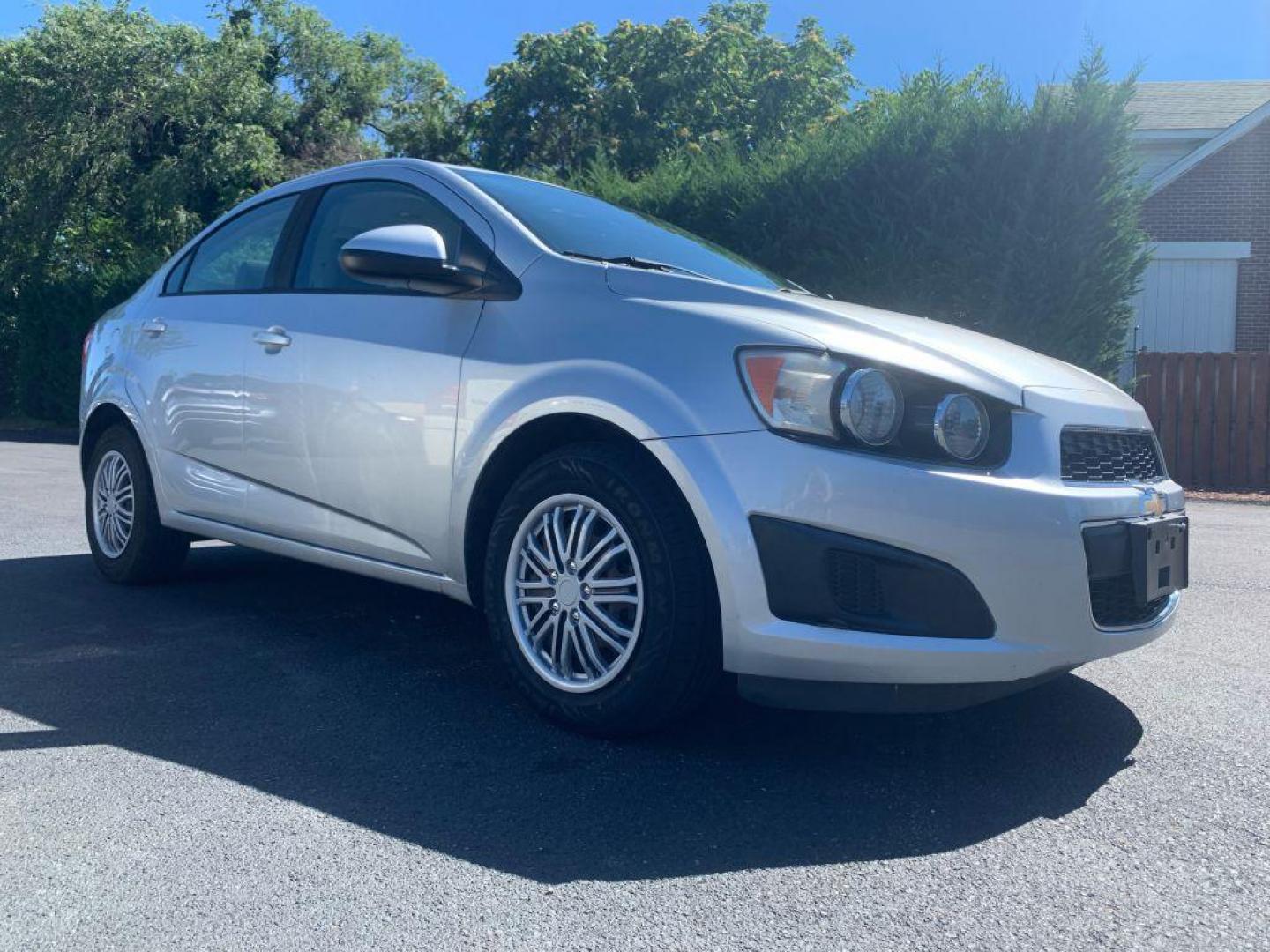 2015 SILVER CHEVROLET SONIC LS (1G1JA5SH5F4) with an 1.8L engine, Automatic transmission, located at 2514 Williamson Rd NE, Roanoke, VA, 24012, (540) 265-7770, 37.294636, -79.936249 - Photo#0