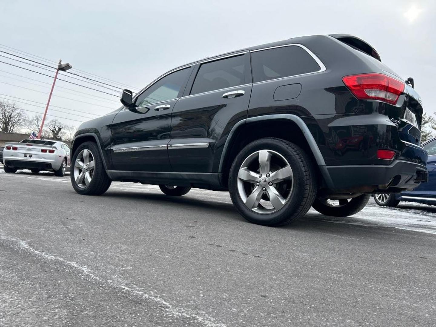 2011 BLACK JEEP GRAND CHEROKEE OVERLAND (1J4RR6GTXBC) with an 5.7L engine, Automatic transmission, located at 2514 Williamson Rd NE, Roanoke, VA, 24012, (540) 265-7770, 37.294636, -79.936249 - Photo#1