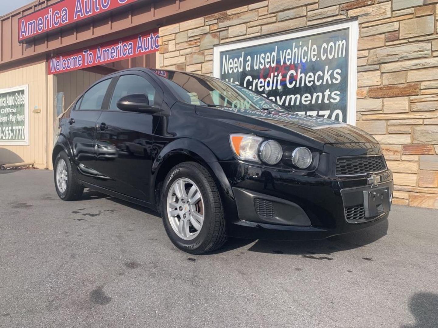 2012 BLACK CHEVROLET SONIC LS (1G1JA5SH5C4) with an 1.8L engine, Automatic transmission, located at 2514 Williamson Rd NE, Roanoke, VA, 24012, (540) 265-7770, 37.294636, -79.936249 - Photo#1