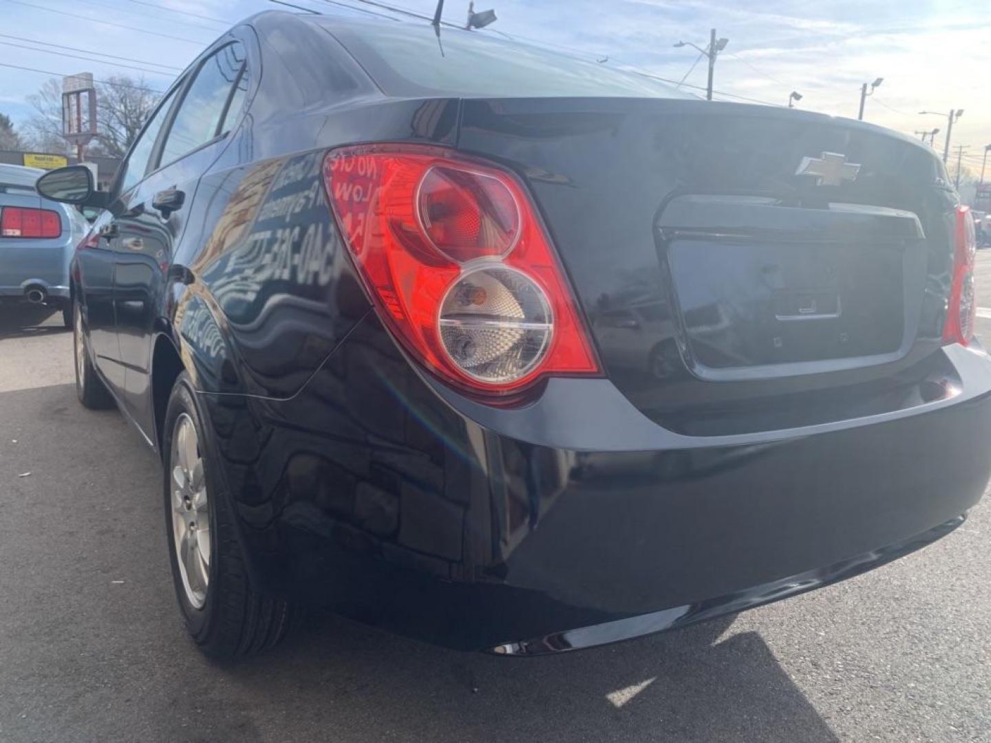 2012 BLACK CHEVROLET SONIC LS (1G1JA5SH5C4) with an 1.8L engine, Automatic transmission, located at 2514 Williamson Rd NE, Roanoke, VA, 24012, (540) 265-7770, 37.294636, -79.936249 - Photo#3