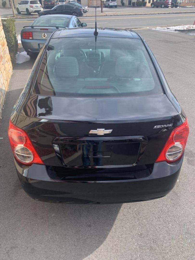 2012 BLACK CHEVROLET SONIC LS (1G1JA5SH5C4) with an 1.8L engine, Automatic transmission, located at 2514 Williamson Rd NE, Roanoke, VA, 24012, (540) 265-7770, 37.294636, -79.936249 - Photo#4