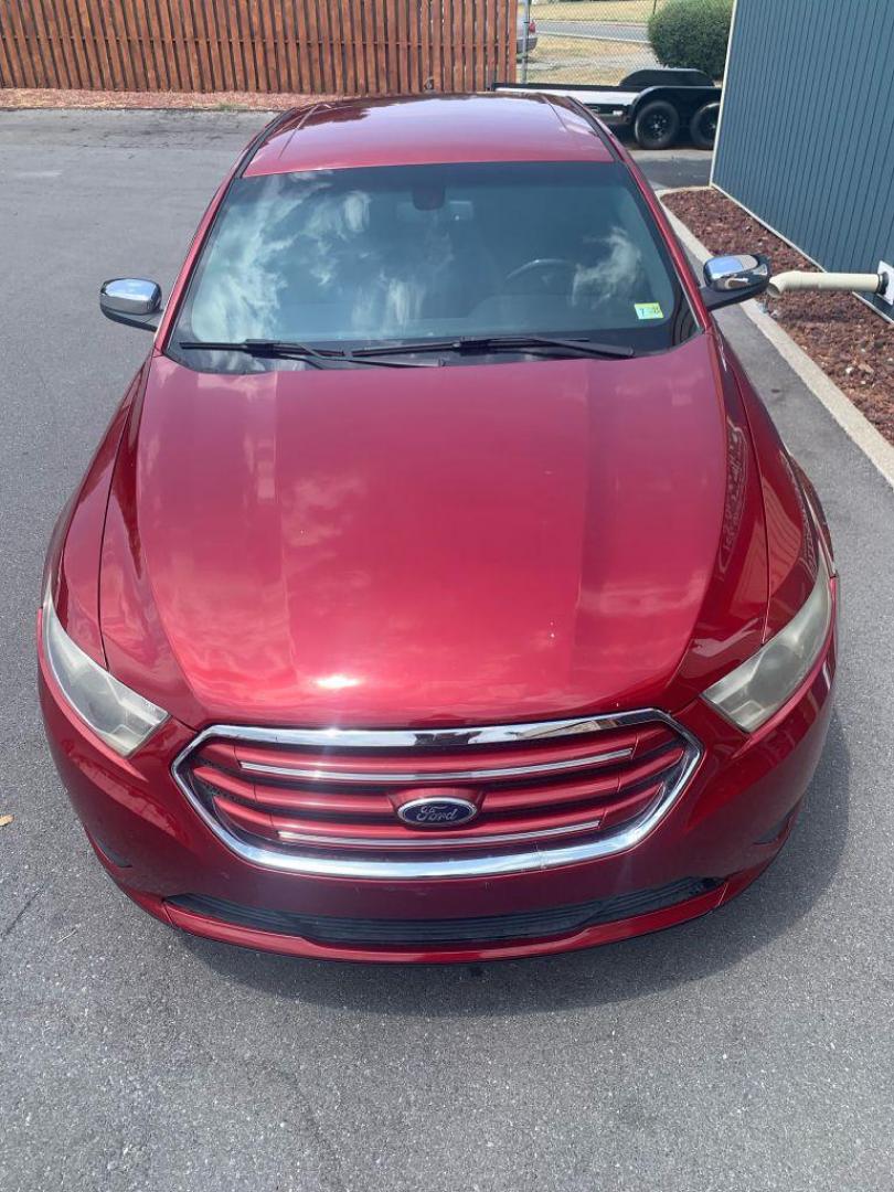 2013 MAROON FORD TAURUS LIMITED (1FAHP2F88DG) with an 3.5L engine, Automatic transmission, located at 2514 Williamson Rd NE, Roanoke, VA, 24012, (540) 265-7770, 37.294636, -79.936249 - Photo#9