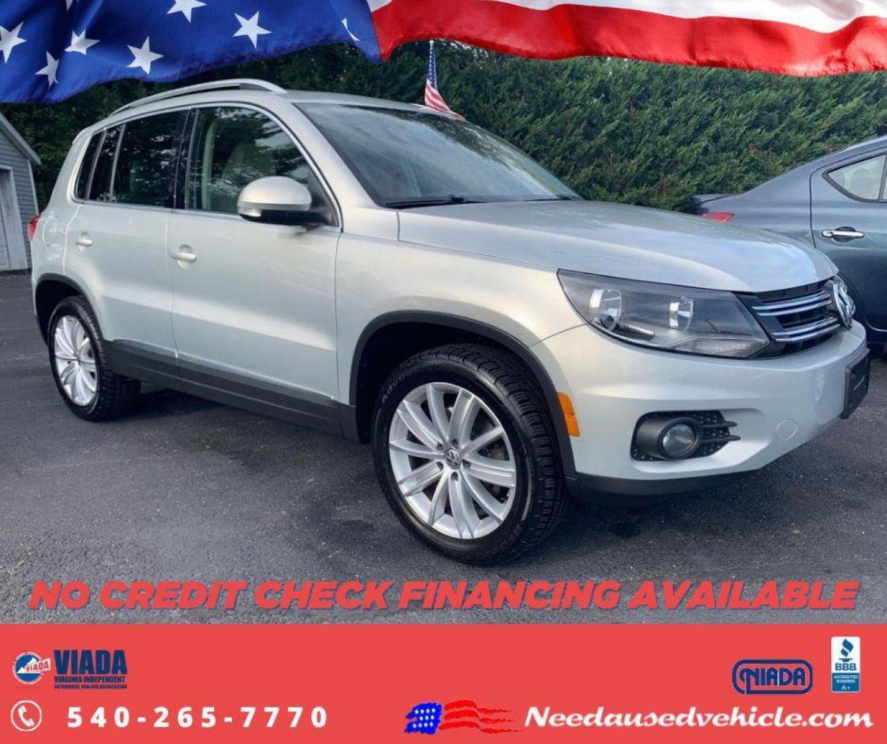 2014 TAN VOLKSWAGEN TIGUAN SEL (WVGBV3AX3EW) with an 2.0L engine, Automatic transmission, located at 2514 Williamson Rd NE, Roanoke, VA, 24012, (540) 265-7770, 37.294636, -79.936249 - NO CREDIT CHECK FINANCING WITH $3300 DOWN PAYMENT!!!! Check out our website www.needausedvehicle.com for our No Credit Check/ In House Financing options!! No Credit Check Available!!! In House Financing Available!!! All Clean Title Vehicles (no Salvaged or flooded vehicles ever on our lot)!!! U - Photo#0