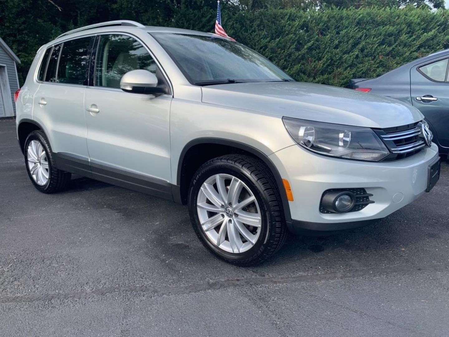 2014 TAN VOLKSWAGEN TIGUAN SEL (WVGBV3AX3EW) with an 2.0L engine, Automatic transmission, located at 2514 Williamson Rd NE, Roanoke, VA, 24012, (540) 265-7770, 37.294636, -79.936249 - NO CREDIT CHECK FINANCING WITH $3300 DOWN PAYMENT!!!! Check out our website www.needausedvehicle.com for our No Credit Check/ In House Financing options!! No Credit Check Available!!! In House Financing Available!!! All Clean Title Vehicles (no Salvaged or flooded vehicles ever on our lot)!!! U - Photo#1