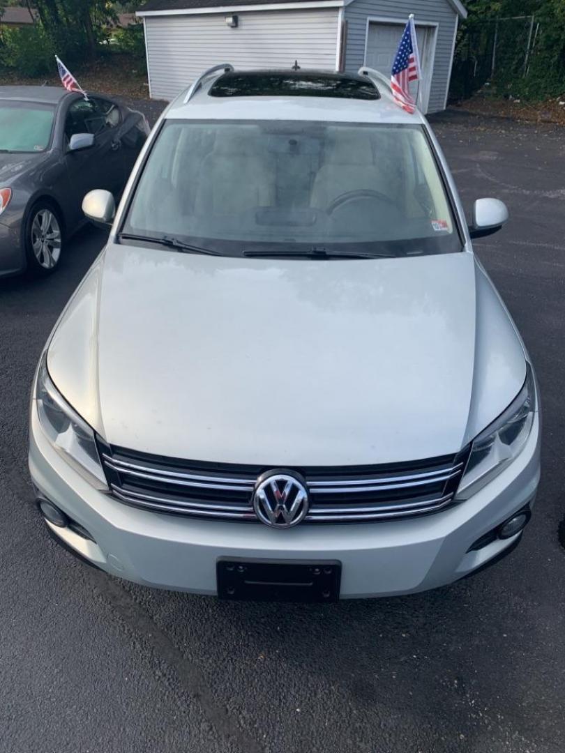 2014 TAN VOLKSWAGEN TIGUAN SEL (WVGBV3AX3EW) with an 2.0L engine, Automatic transmission, located at 2514 Williamson Rd NE, Roanoke, VA, 24012, (540) 265-7770, 37.294636, -79.936249 - NO CREDIT CHECK FINANCING WITH $3300 DOWN PAYMENT!!!! Check out our website www.needausedvehicle.com for our No Credit Check/ In House Financing options!! No Credit Check Available!!! In House Financing Available!!! All Clean Title Vehicles (no Salvaged or flooded vehicles ever on our lot)!!! U - Photo#2