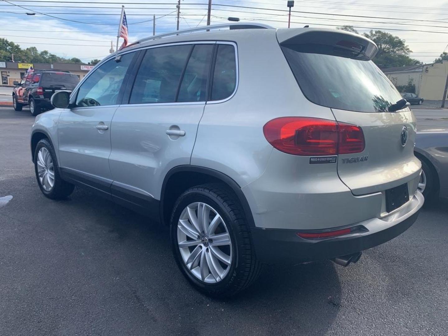 2014 TAN VOLKSWAGEN TIGUAN SEL (WVGBV3AX3EW) with an 2.0L engine, Automatic transmission, located at 2514 Williamson Rd NE, Roanoke, VA, 24012, (540) 265-7770, 37.294636, -79.936249 - NO CREDIT CHECK FINANCING WITH $3300 DOWN PAYMENT!!!! Check out our website www.needausedvehicle.com for our No Credit Check/ In House Financing options!! No Credit Check Available!!! In House Financing Available!!! All Clean Title Vehicles (no Salvaged or flooded vehicles ever on our lot)!!! U - Photo#3