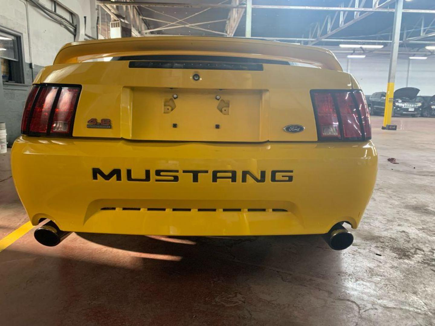 1999 YELLOW FORD MUSTANG GT (1FAFP45X2XF) with an 4.6L engine, 4-Speed Manual transmission, located at 2514 Williamson Rd NE, Roanoke, VA, 24012, (540) 265-7770, 37.294636, -79.936249 - **** CASH ONLY PRICE IS $17000 (NOT INCLUDING SALES TAX, TAGS, TITLING AND PROCESSING FEE) **** ************VEHICLE SHOWN BY APPOINTMENT ONLY********************** This beautiful, well maintained convertible show car is equipped with Kenny Bell Supercharged 4.6 L engine - Photo#8