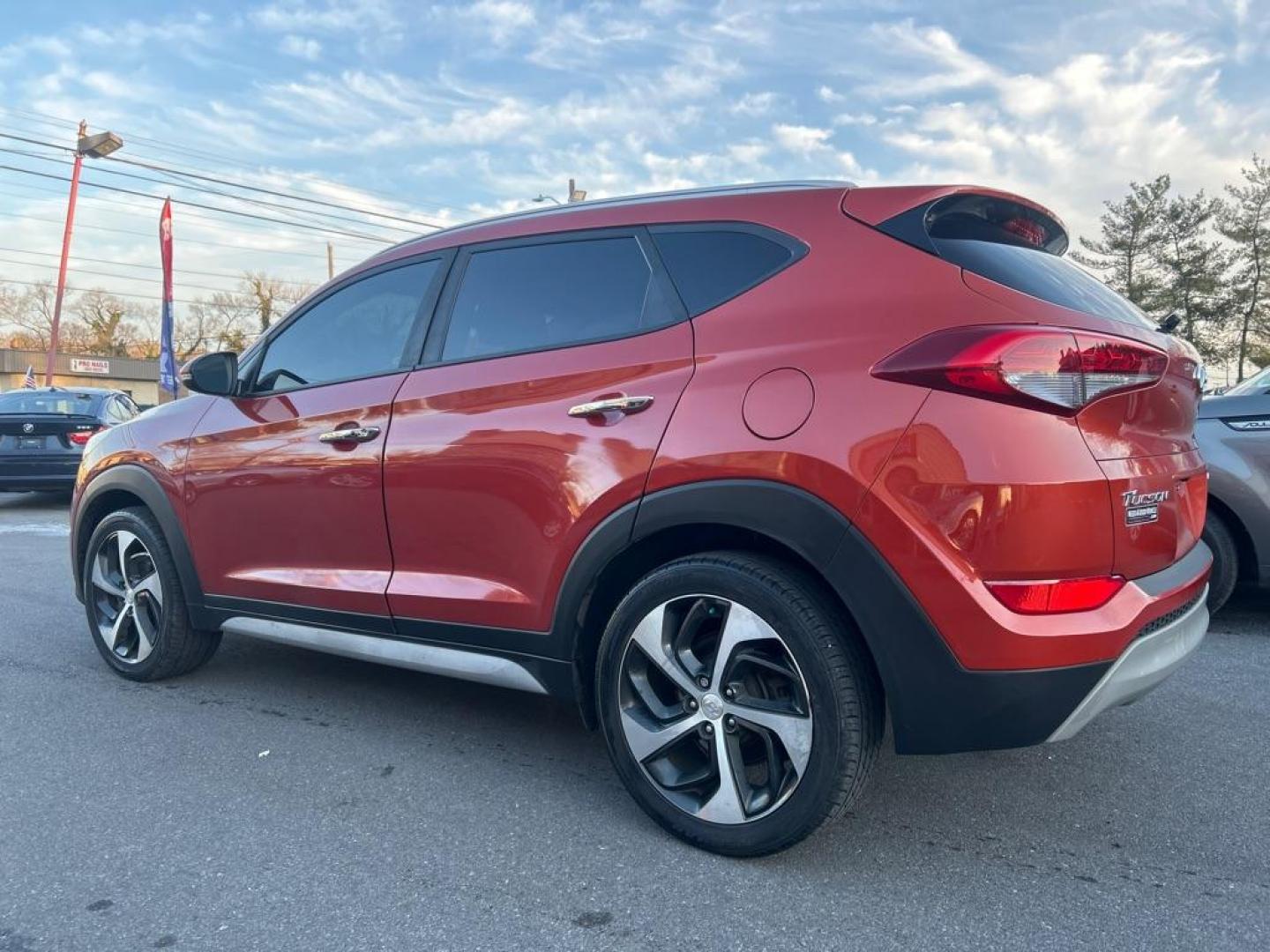 2017 ORANGE HYUNDAI TUCSON LIMITED (KM8J3CA20HU) with an 1.6L engine, Automatic transmission, located at 2514 Williamson Rd NE, Roanoke, VA, 24012, (540) 265-7770, 37.294636, -79.936249 - Photo#2