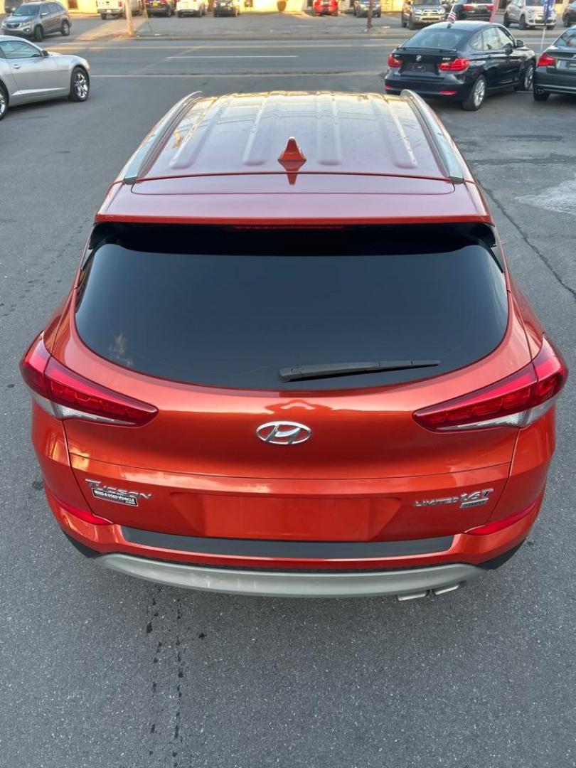 2017 ORANGE HYUNDAI TUCSON LIMITED (KM8J3CA20HU) with an 1.6L engine, Automatic transmission, located at 2514 Williamson Rd NE, Roanoke, VA, 24012, (540) 265-7770, 37.294636, -79.936249 - Photo#3