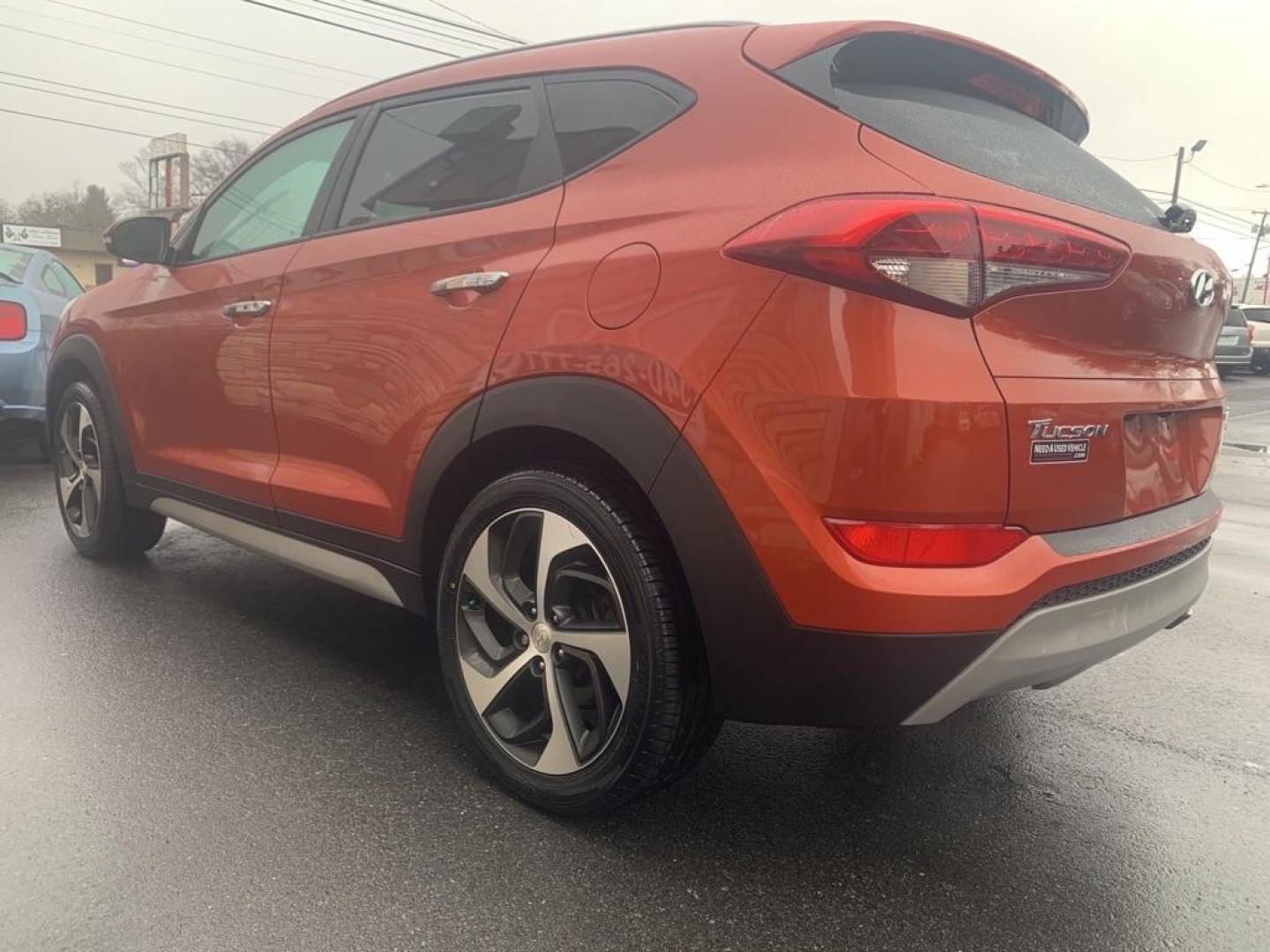 2017 ORANGE HYUNDAI TUCSON LIMITED (KM8J3CA20HU) with an 1.6L engine, Automatic transmission, located at 2514 Williamson Rd NE, Roanoke, VA, 24012, (540) 265-7770, 37.294636, -79.936249 - Photo#2