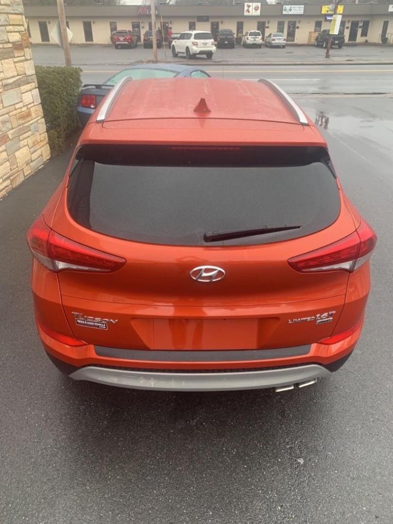 2017 ORANGE HYUNDAI TUCSON LIMITED (KM8J3CA20HU) with an 1.6L engine, Automatic transmission, located at 2514 Williamson Rd NE, Roanoke, VA, 24012, (540) 265-7770, 37.294636, -79.936249 - Photo#3