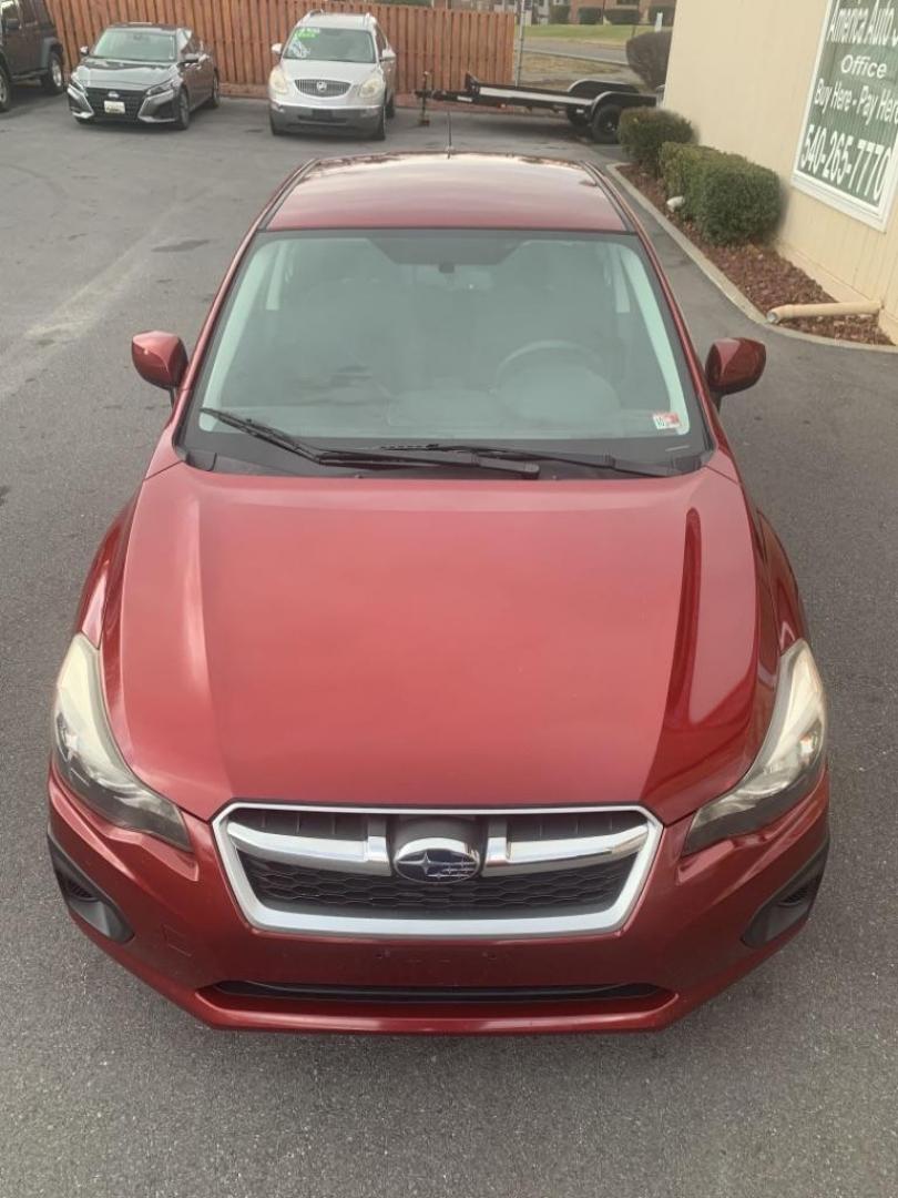 2012 RED SUBARU IMPREZA PREMIUM (JF1GJAB61CH) with an 2.0L engine, Continuously Variable transmission, located at 2514 Williamson Rd NE, Roanoke, VA, 24012, (540) 265-7770, 37.294636, -79.936249 - Photo#2