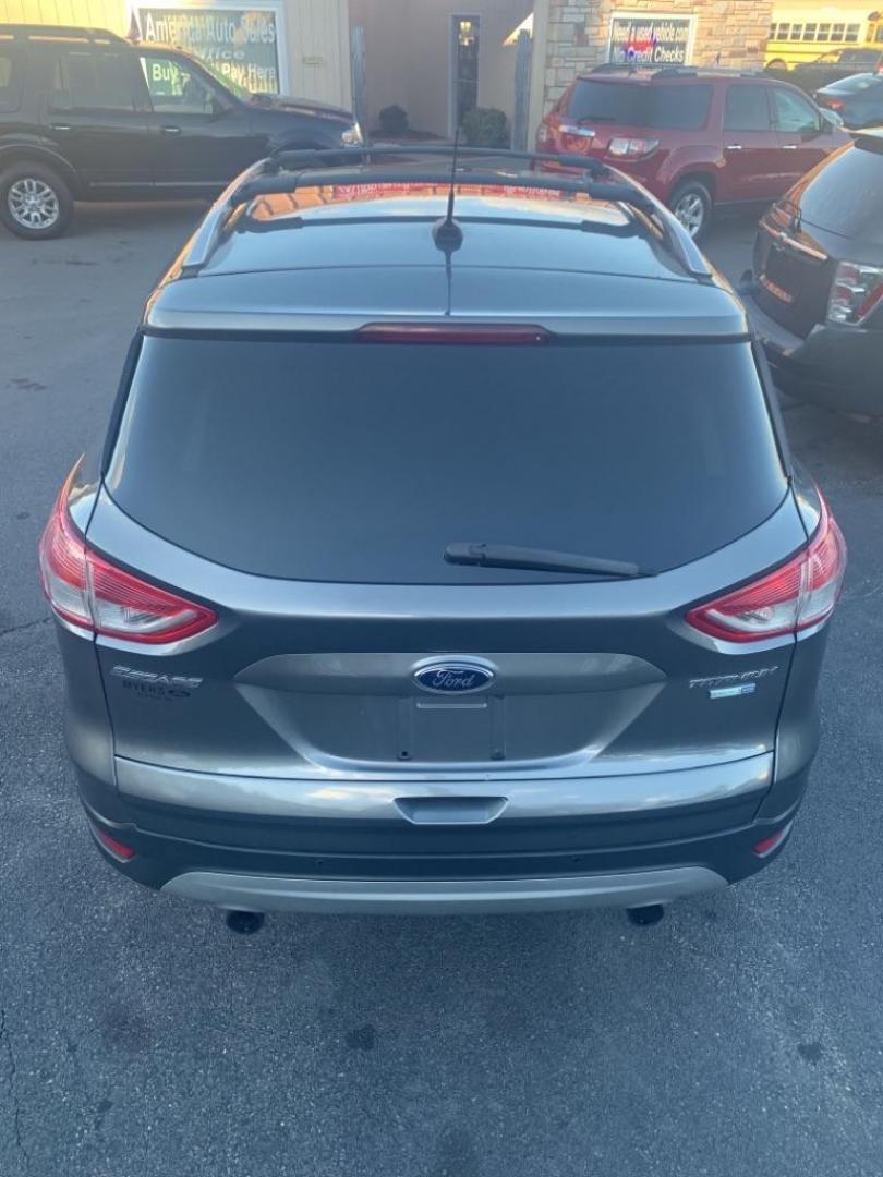 2013 GRAY FORD ESCAPE TITANIUM (1FMCU9J91DU) with an 2.0L engine, Automatic transmission, located at 2514 Williamson Rd NE, Roanoke, VA, 24012, (540) 265-7770, 37.294636, -79.936249 - Photo#4