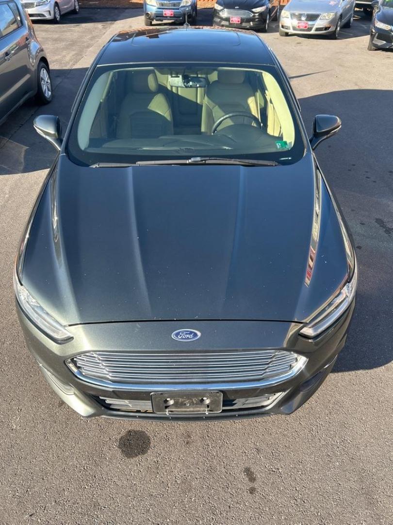 2015 GREEN FORD FUSION SE (3FA6P0HD5FR) with an 1.5L engine, Automatic transmission, located at 2514 Williamson Rd NE, Roanoke, VA, 24012, (540) 265-7770, 37.294636, -79.936249 - NO CREDIT CHECK FINANCING WITH ONLY $2700 DOWN PAYMENT!!!! Check out our website www.needausedvehicle.com for our No Credit Check/ In House Financing options!! No Credit Check Available!!! In House Financing Available!!! All Clean Title Vehicles (no Salvaged or flooded vehicles ever on our lot)! - Photo#10