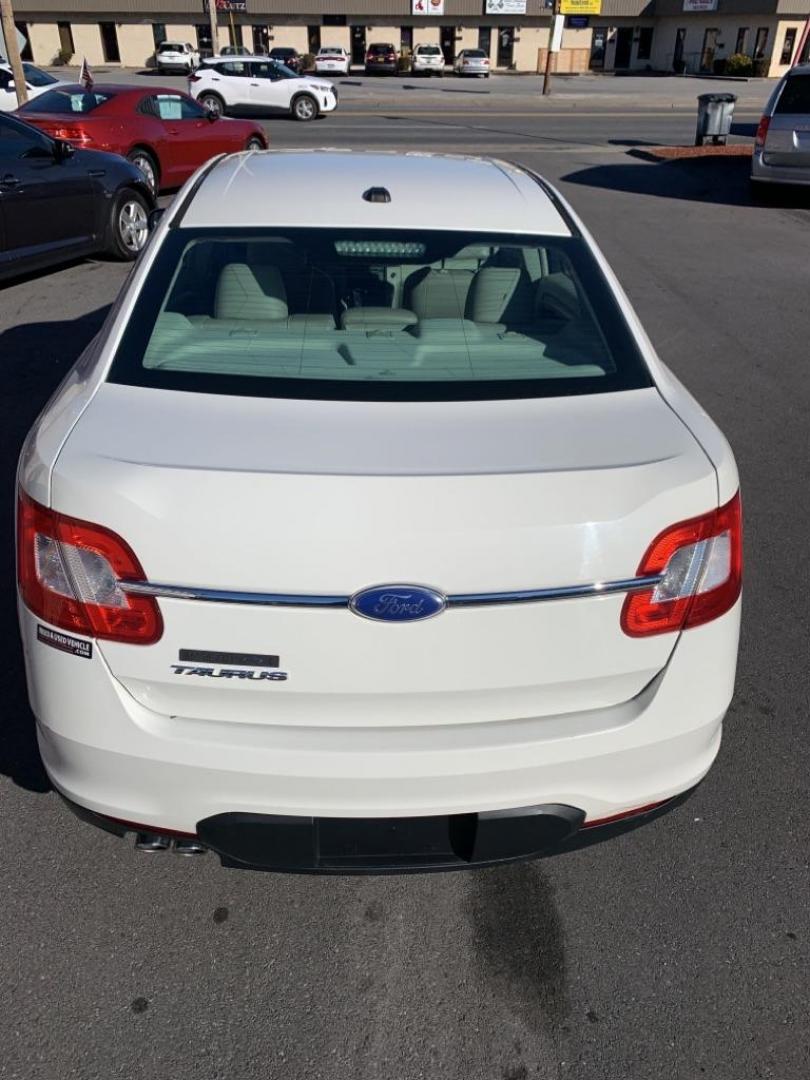 2011 WHITE FORD TAURUS SE (1FAHP2DW0BG) with an 3.5L engine, Automatic transmission, located at 2514 Williamson Rd NE, Roanoke, VA, 24012, (540) 265-7770, 37.294636, -79.936249 - Photo#4