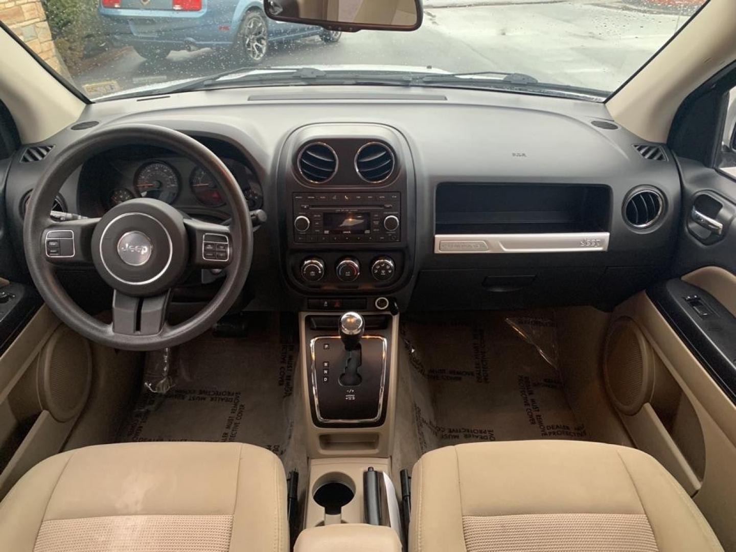 2015 WHITE JEEP COMPASS SPORT (1C4NJDBB1FD) with an 2.4L engine, Continuously Variable transmission, located at 2514 Williamson Rd NE, Roanoke, VA, 24012, (540) 265-7770, 37.294636, -79.936249 - Photo#6