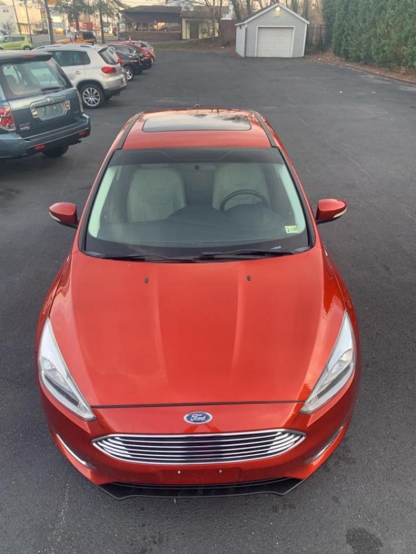 2018 RED FORD FOCUS TITANIUM (1FADP3J25JL) with an 2.0L engine, Automatic transmission, located at 2514 Williamson Rd NE, Roanoke, VA, 24012, (540) 265-7770, 37.294636, -79.936249 - Photo#1