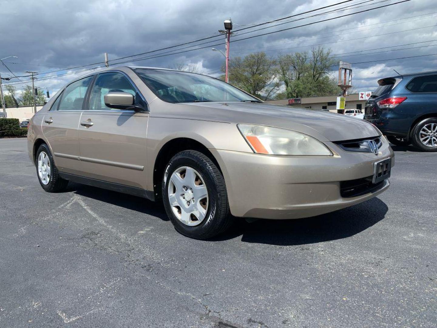 2005 GOLD HONDA ACCORD LX (1HGCM56485A) with an 2.4L engine, Automatic transmission, located at 2514 Williamson Rd NE, Roanoke, VA, 24012, (540) 265-7770, 37.294636, -79.936249 - Photo#0