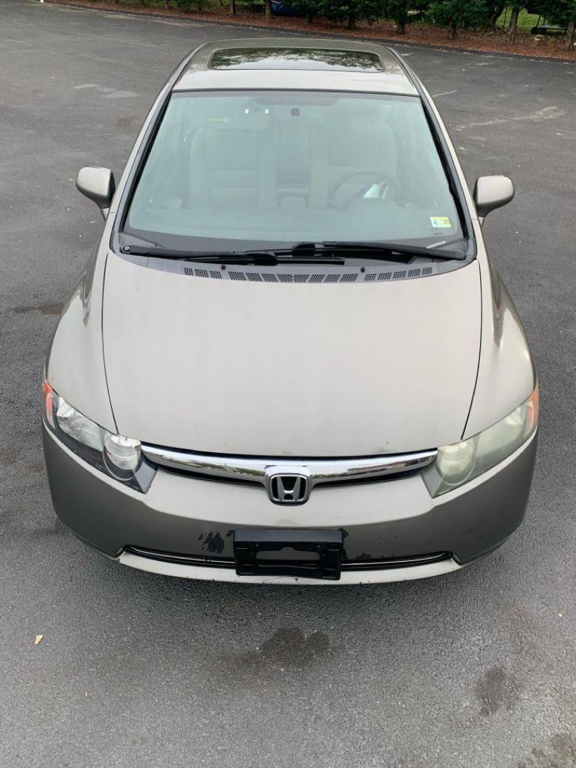 2007 GRAY HONDA CIVIC EX (1HGFA16857L) with an 1.8L engine, Automatic transmission, located at 2514 Williamson Rd NE, Roanoke, VA, 24012, (540) 265-7770, 37.294636, -79.936249 - Photo#8