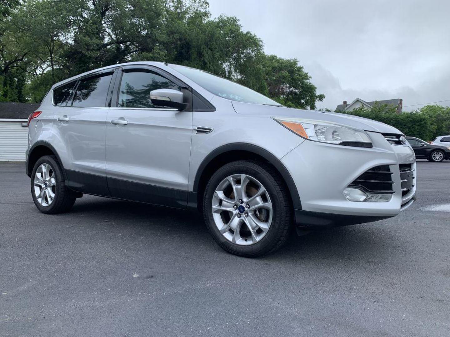 2013 SILVER FORD ESCAPE SEL (1FMCU9H95DU) with an 2.0L engine, Automatic transmission, located at 2514 Williamson Rd NE, Roanoke, VA, 24012, (540) 265-7770, 37.294636, -79.936249 - Photo#0