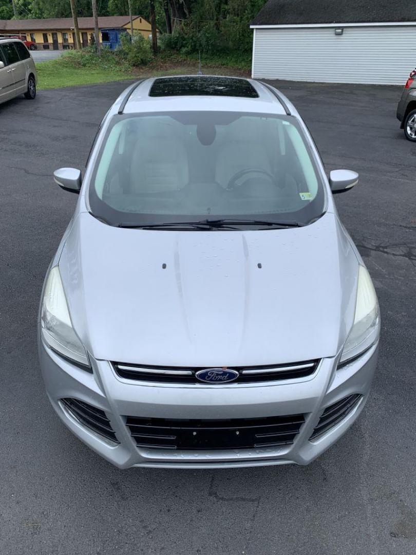 2013 SILVER FORD ESCAPE SEL (1FMCU9H95DU) with an 2.0L engine, Automatic transmission, located at 2514 Williamson Rd NE, Roanoke, VA, 24012, (540) 265-7770, 37.294636, -79.936249 - Photo#9