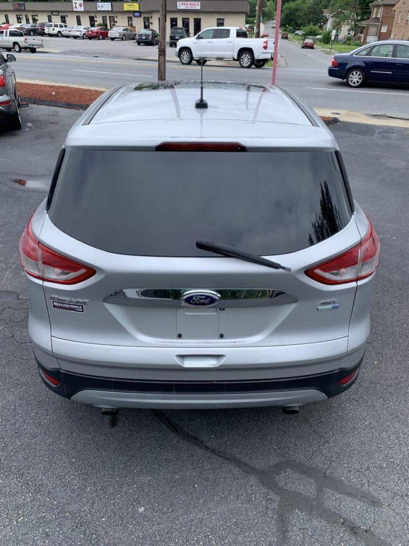 2013 SILVER FORD ESCAPE SEL (1FMCU9H95DU) with an 2.0L engine, Automatic transmission, located at 2514 Williamson Rd NE, Roanoke, VA, 24012, (540) 265-7770, 37.294636, -79.936249 - Photo#10