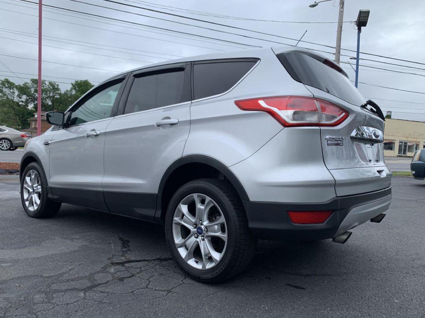 2013 SILVER FORD ESCAPE SEL (1FMCU9H95DU) with an 2.0L engine, Automatic transmission, located at 2514 Williamson Rd NE, Roanoke, VA, 24012, (540) 265-7770, 37.294636, -79.936249 - Photo#1