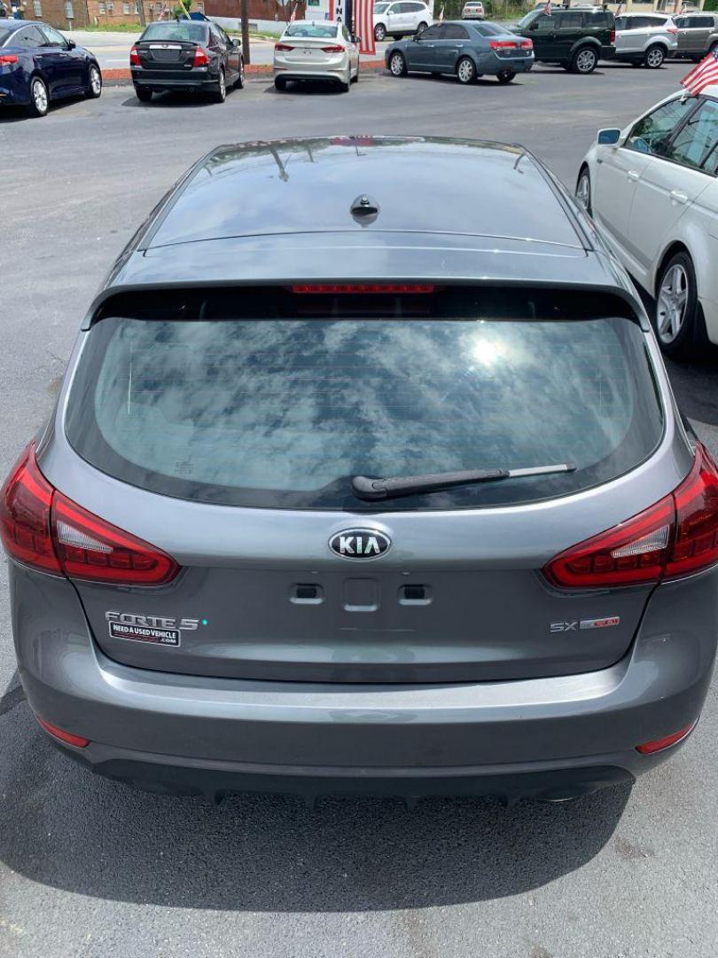 2015 GRAY KIA FORTE SX (KNAFZ5A35F5) with an 1.6L engine, 6-Speed Manual transmission, located at 2514 Williamson Rd NE, Roanoke, VA, 24012, (540) 265-7770, 37.294636, -79.936249 - Photo#10