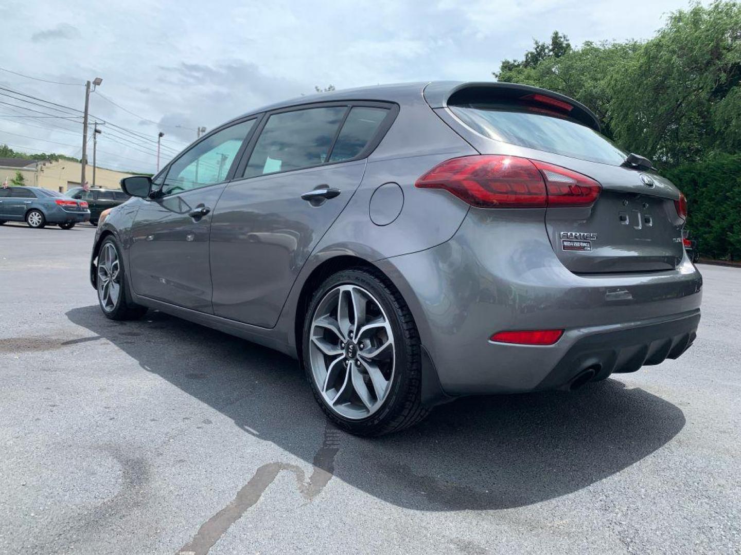 2015 GRAY KIA FORTE SX (KNAFZ5A35F5) with an 1.6L engine, 6-Speed Manual transmission, located at 2514 Williamson Rd NE, Roanoke, VA, 24012, (540) 265-7770, 37.294636, -79.936249 - Photo#1