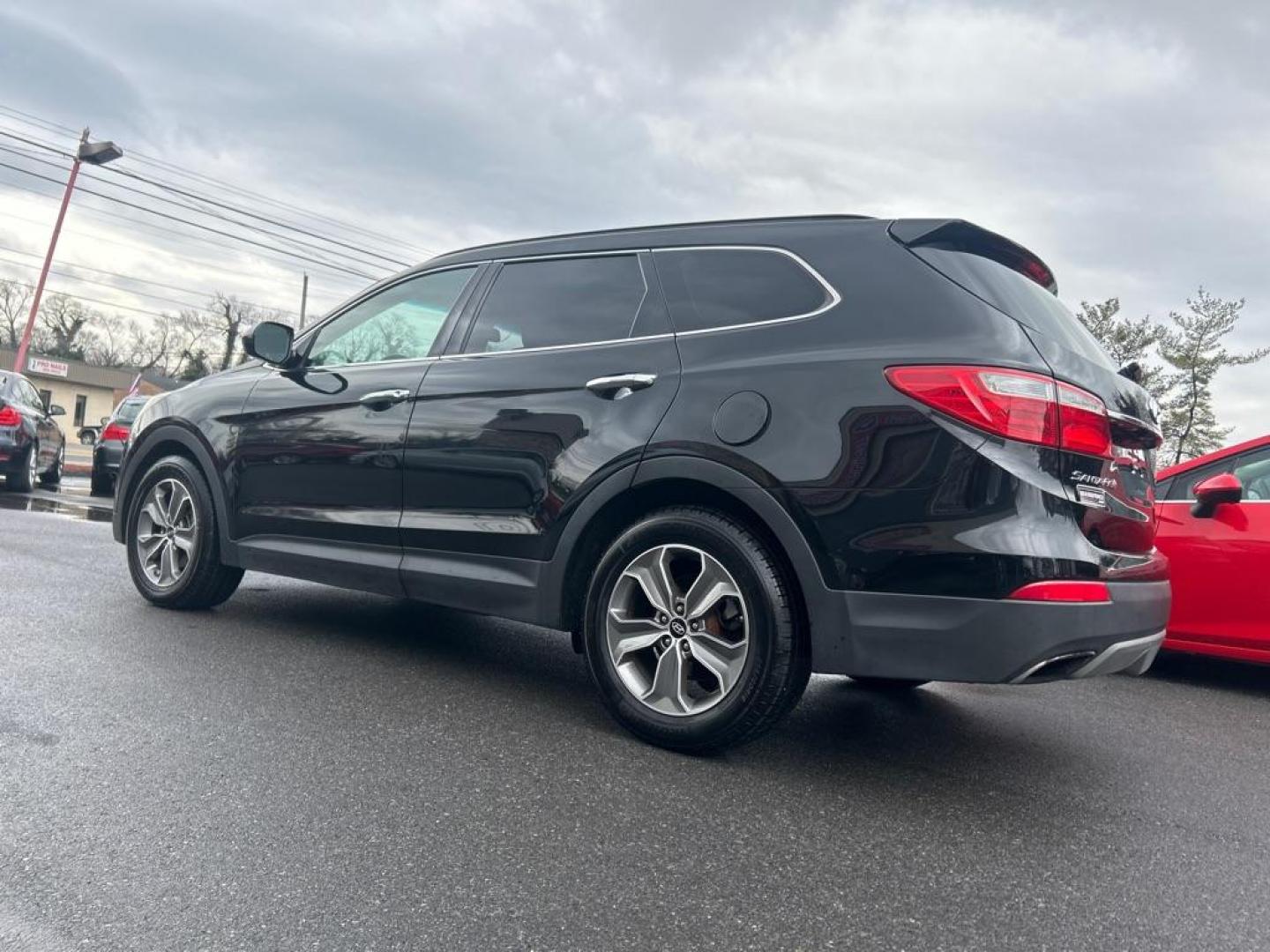 2014 BLACK HYUNDAI SANTA FE GLS (KM8SMDHFXEU) with an 3.3L engine, Automatic transmission, located at 2514 Williamson Rd NE, Roanoke, VA, 24012, (540) 265-7770, 37.294636, -79.936249 - NO CREDIT CHECK FINANCING WITH ONLY $2800 DOWN PAYMENT!!!! Check out our website www.needausedvehicle.com for our No Credit Check/ In House Financing options!! No Credit Check Available!!! In House Financing Available!!! All Clean Title Vehicles (no Salvaged or flooded vehicles ever on our lot)! - Photo#1