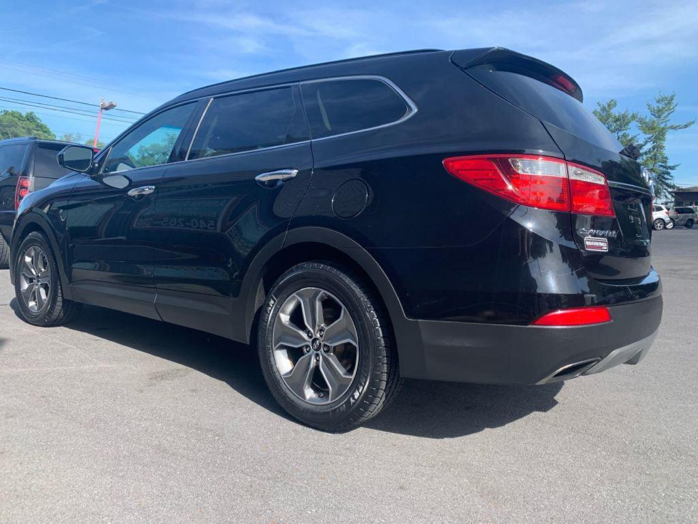 2014 BLACK HYUNDAI SANTA FE GLS (KM8SMDHFXEU) with an 3.3L engine, Automatic transmission, located at 2514 Williamson Rd NE, Roanoke, VA, 24012, (540) 265-7770, 37.294636, -79.936249 - NO CREDIT CHECK FINANCING WITH ONLY $2800 DOWN PAYMENT!!!! Check out our website www.needausedvehicle.com for our No Credit Check/ In House Financing options!! No Credit Check Available!!! In House Financing Available!!! All Clean Title Vehicles (no Salvaged or flooded vehicles ever on our lot)! - Photo#1