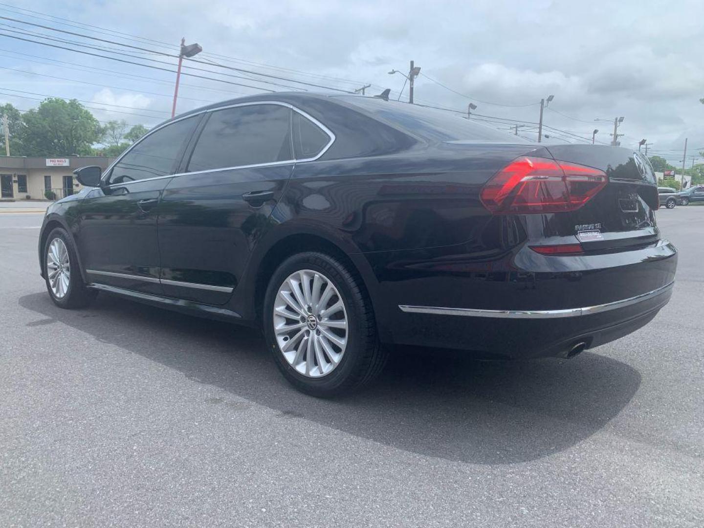 2017 BLACK VOLKSWAGEN PASSAT SE (1VWBT7A3XHC) with an 1.8L engine, Automatic transmission, located at 2514 Williamson Rd NE, Roanoke, VA, 24012, (540) 265-7770, 37.294636, -79.936249 - NO CREDIT CHECK FINANCING WITH ONLY $3800 DOWN PAYMENT!!!! Check out our website www.needausedvehicle.com for our No Credit Check/ In House Financing options!! No Credit Check Available!!! In House Financing Available!!! All Clean Title Vehicles (no Salvaged or flooded vehicles ever on our lot)! - Photo#1