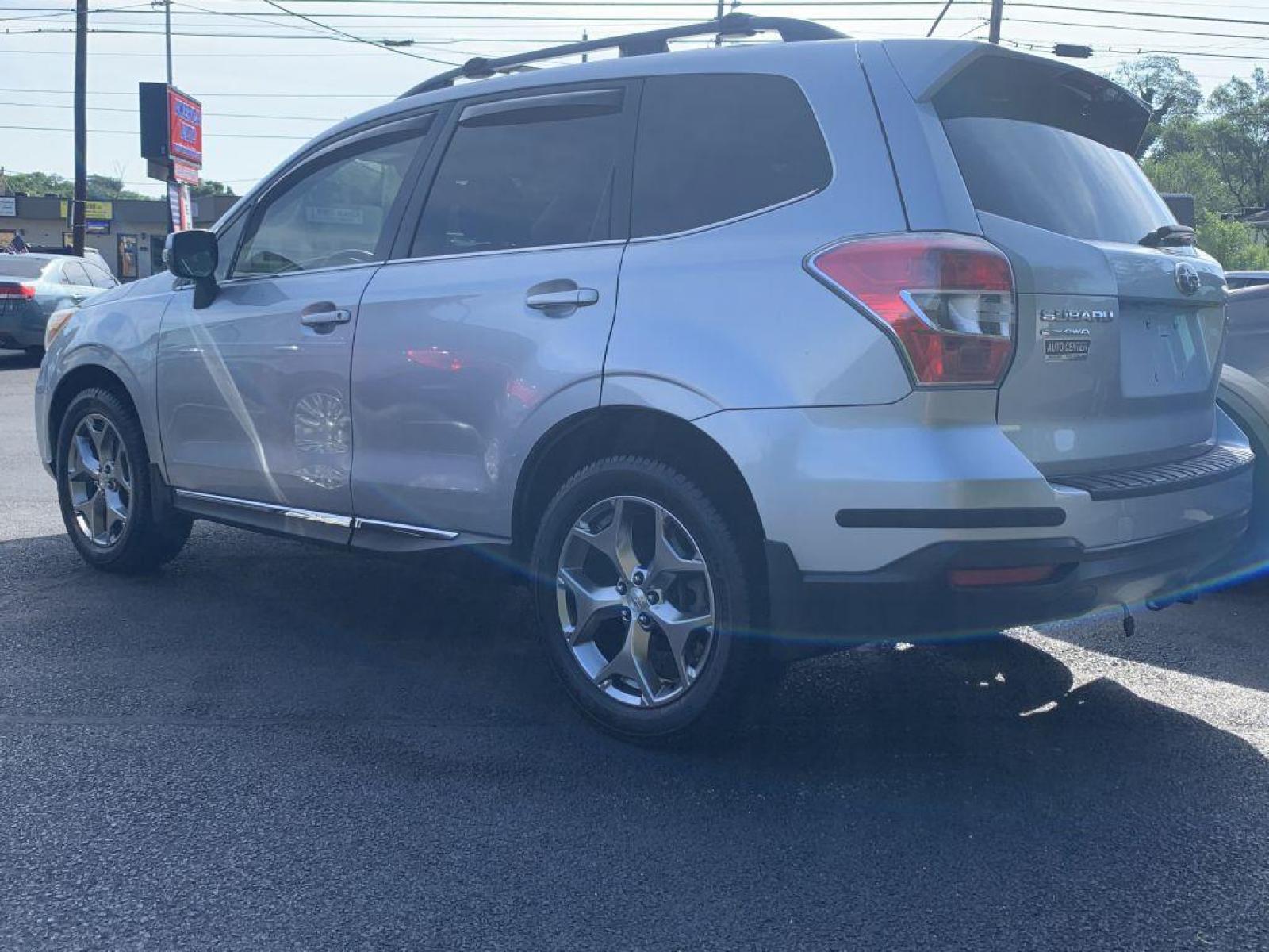 2015 SILVER SUBARU FORESTER 2.5I TOURING (JF2SJAWC8FH) with an 2.5L engine, Continuously Variable transmission, located at 2514 Williamson Rd NE, Roanoke, VA, 24012, (540) 265-7770, 37.294636, -79.936249 - NO CREDIT CHECK FINANCING WITH ONLY $2300 DOWN PAYMENT!!!! Check out our website www.needausedvehicle.com for our No Credit Check/ In House Financing options!! No Credit Check Available!!! In House Financing Available!!! All Clean Title Vehicles (no Salvaged or flooded vehicles ever on our lot)! - Photo #1