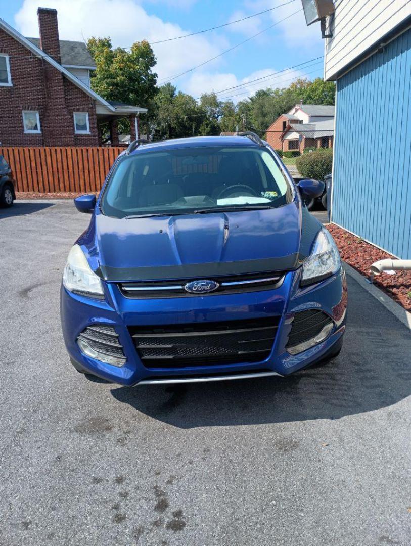 2014 BLUE FORD ESCAPE SE (1FMCU9G97EU) with an 2.0L engine, Automatic transmission, located at 2514 Williamson Rd NE, Roanoke, VA, 24012, (540) 265-7770, 37.294636, -79.936249 - Photo#2