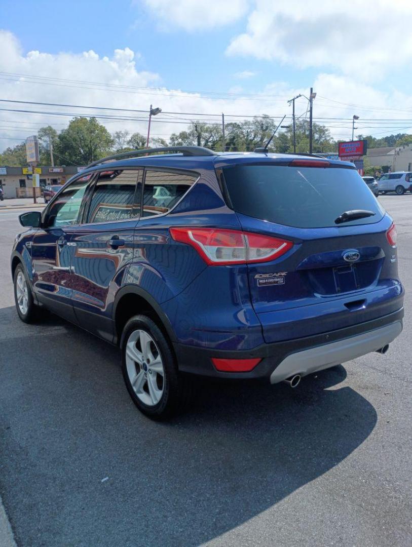 2014 BLUE FORD ESCAPE SE (1FMCU9G97EU) with an 2.0L engine, Automatic transmission, located at 2514 Williamson Rd NE, Roanoke, VA, 24012, (540) 265-7770, 37.294636, -79.936249 - Photo#3