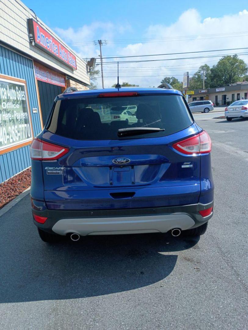 2014 BLUE FORD ESCAPE SE (1FMCU9G97EU) with an 2.0L engine, Automatic transmission, located at 2514 Williamson Rd NE, Roanoke, VA, 24012, (540) 265-7770, 37.294636, -79.936249 - Photo#4