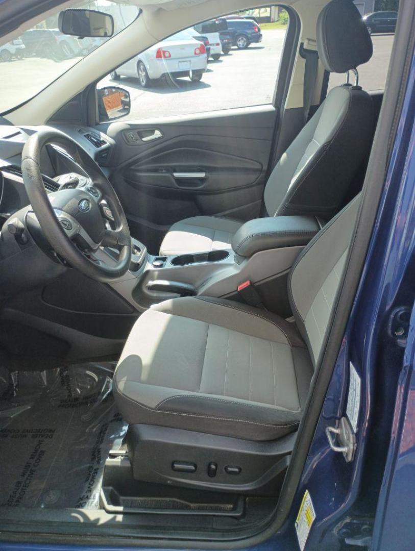 2014 BLUE FORD ESCAPE SE (1FMCU9G97EU) with an 2.0L engine, Automatic transmission, located at 2514 Williamson Rd NE, Roanoke, VA, 24012, (540) 265-7770, 37.294636, -79.936249 - Photo#7