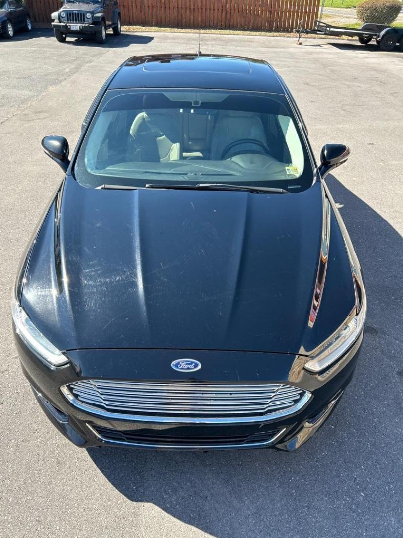 2016 BLACK FORD FUSION TITANIUM (3FA6P0K92GR) with an 2.0L engine, Automatic transmission, located at 2514 Williamson Rd NE, Roanoke, VA, 24012, (540) 265-7770, 37.294636, -79.936249 - Photo#10