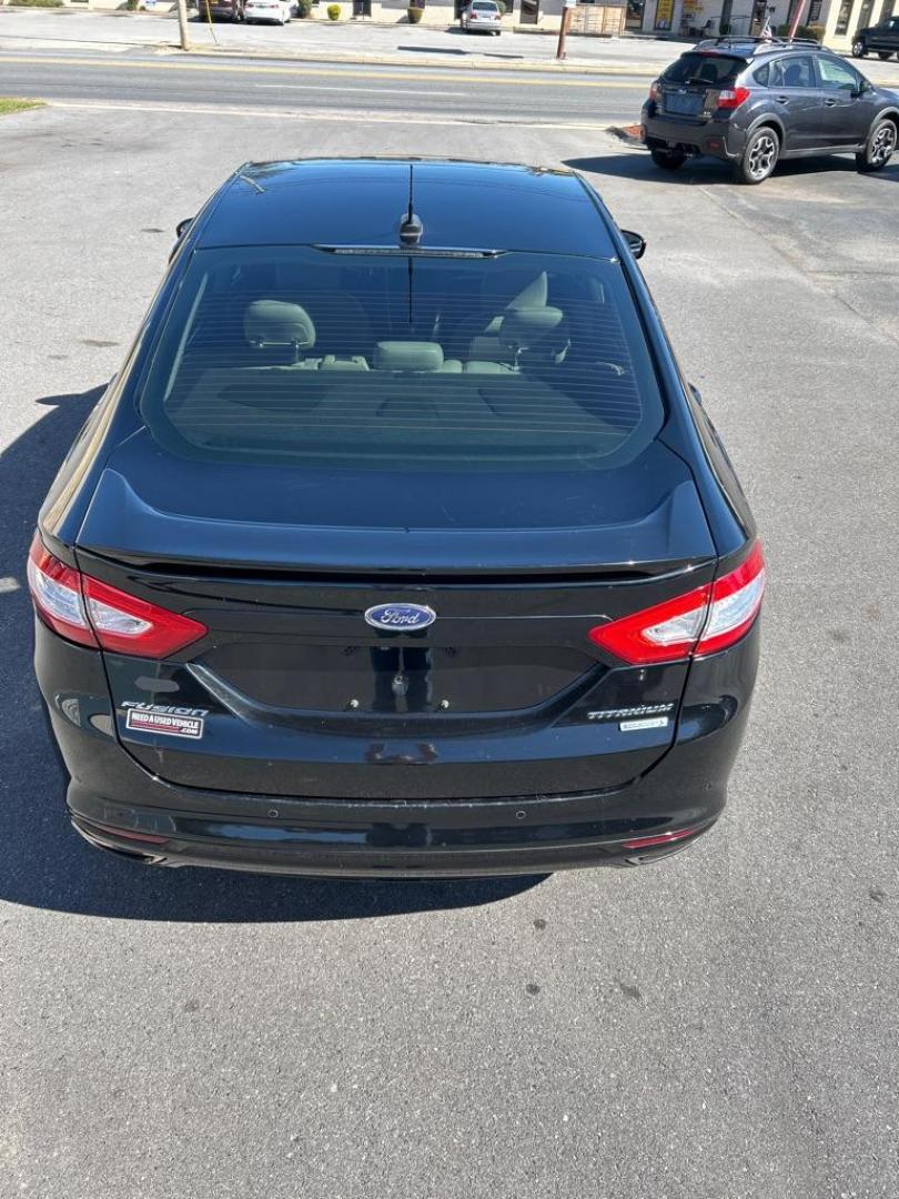 2016 BLACK FORD FUSION TITANIUM (3FA6P0K92GR) with an 2.0L engine, Automatic transmission, located at 2514 Williamson Rd NE, Roanoke, VA, 24012, (540) 265-7770, 37.294636, -79.936249 - Photo#11