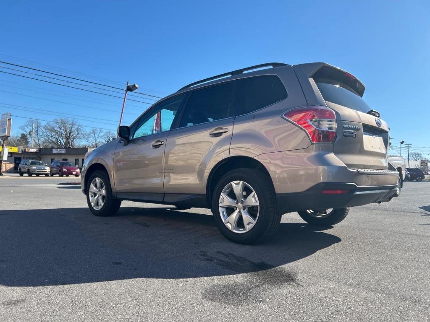 2016 TAN SUBARU FORESTER 2.5I LIMITED (JF2SJAHC2GH) with an 2.5L engine, Continuously Variable transmission, located at 2514 Williamson Rd NE, Roanoke, VA, 24012, (540) 265-7770, 37.294636, -79.936249 - Photo#1