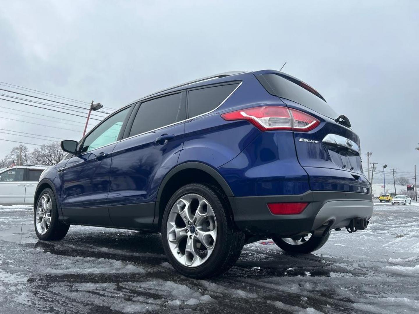 2015 BLUE FORD ESCAPE TITANIUM (1FMCU9J93FU) with an 2.0L engine, Automatic transmission, located at 2514 Williamson Rd NE, Roanoke, VA, 24012, (540) 265-7770, 37.294636, -79.936249 - Photo#1