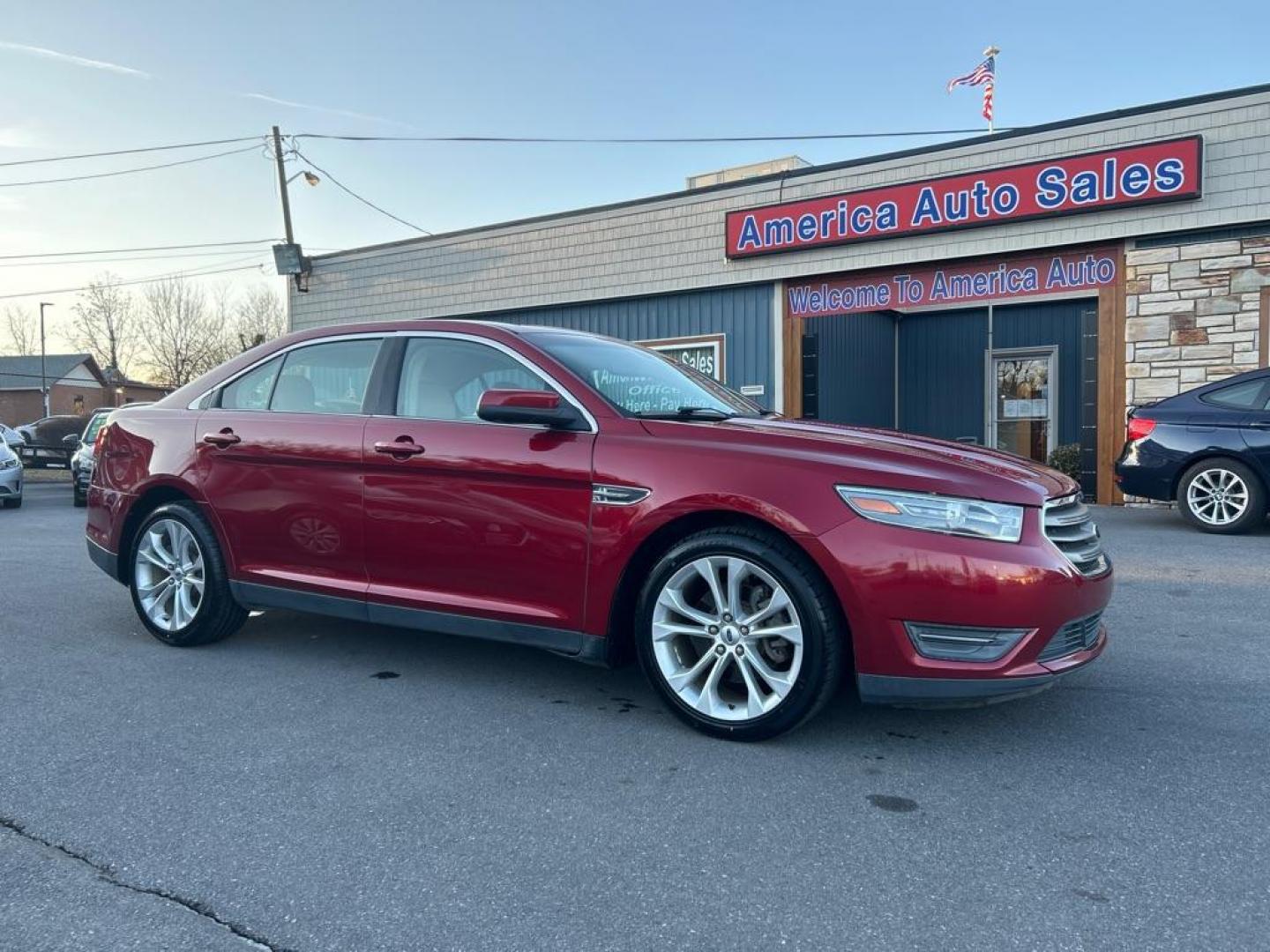 2013 RED FORD TAURUS SEL (1FAHP2E81DG) with an 3.5L engine, Automatic transmission, located at 2514 Williamson Rd NE, Roanoke, VA, 24012, (540) 265-7770, 37.294636, -79.936249 - NO CREDIT CHECK FINANCING WITH ONLY $3000 DOWN PAYMENT!!!! Check out our website www.needausedvehicle.com for our No Credit Check/ In House Financing options!! No Credit Check Available!!! In House Financing Available!!! All Clean Title Vehicles (no Salvaged or flooded vehicles ever on our lot)! - Photo#0