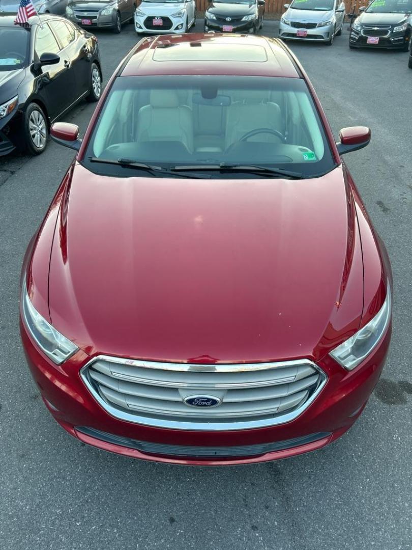 2013 RED FORD TAURUS SEL (1FAHP2E81DG) with an 3.5L engine, Automatic transmission, located at 2514 Williamson Rd NE, Roanoke, VA, 24012, (540) 265-7770, 37.294636, -79.936249 - NO CREDIT CHECK FINANCING WITH ONLY $3000 DOWN PAYMENT!!!! Check out our website www.needausedvehicle.com for our No Credit Check/ In House Financing options!! No Credit Check Available!!! In House Financing Available!!! All Clean Title Vehicles (no Salvaged or flooded vehicles ever on our lot)! - Photo#10