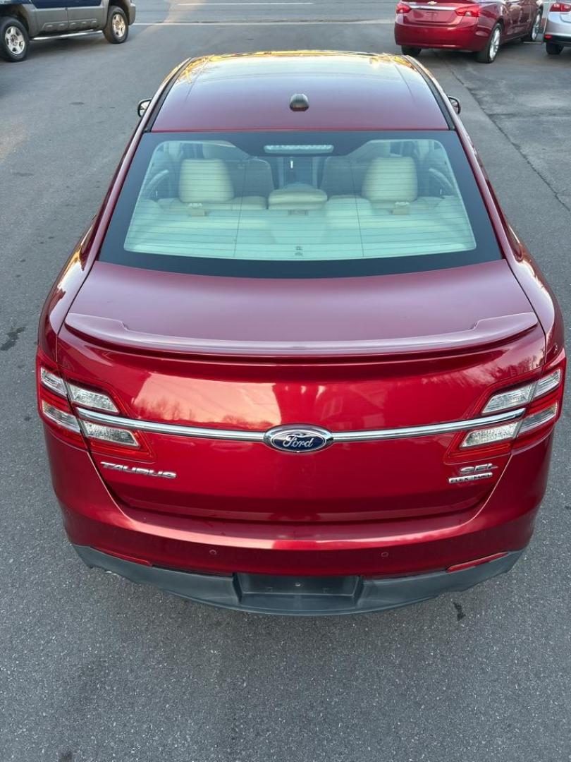 2013 RED FORD TAURUS SEL (1FAHP2E81DG) with an 3.5L engine, Automatic transmission, located at 2514 Williamson Rd NE, Roanoke, VA, 24012, (540) 265-7770, 37.294636, -79.936249 - NO CREDIT CHECK FINANCING WITH ONLY $3000 DOWN PAYMENT!!!! Check out our website www.needausedvehicle.com for our No Credit Check/ In House Financing options!! No Credit Check Available!!! In House Financing Available!!! All Clean Title Vehicles (no Salvaged or flooded vehicles ever on our lot)! - Photo#11