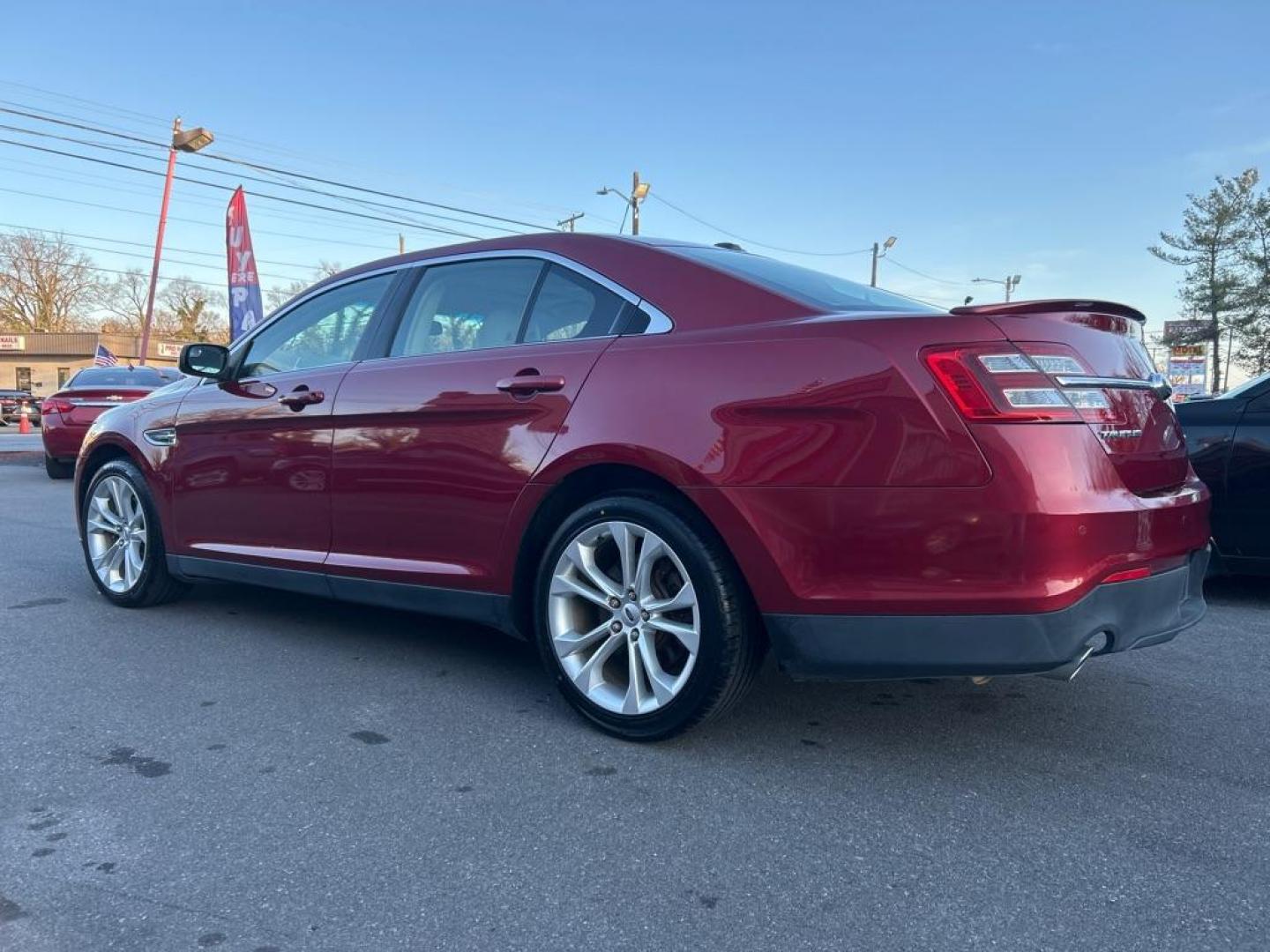 2013 RED FORD TAURUS SEL (1FAHP2E81DG) with an 3.5L engine, Automatic transmission, located at 2514 Williamson Rd NE, Roanoke, VA, 24012, (540) 265-7770, 37.294636, -79.936249 - NO CREDIT CHECK FINANCING WITH ONLY $3000 DOWN PAYMENT!!!! Check out our website www.needausedvehicle.com for our No Credit Check/ In House Financing options!! No Credit Check Available!!! In House Financing Available!!! All Clean Title Vehicles (no Salvaged or flooded vehicles ever on our lot)! - Photo#1