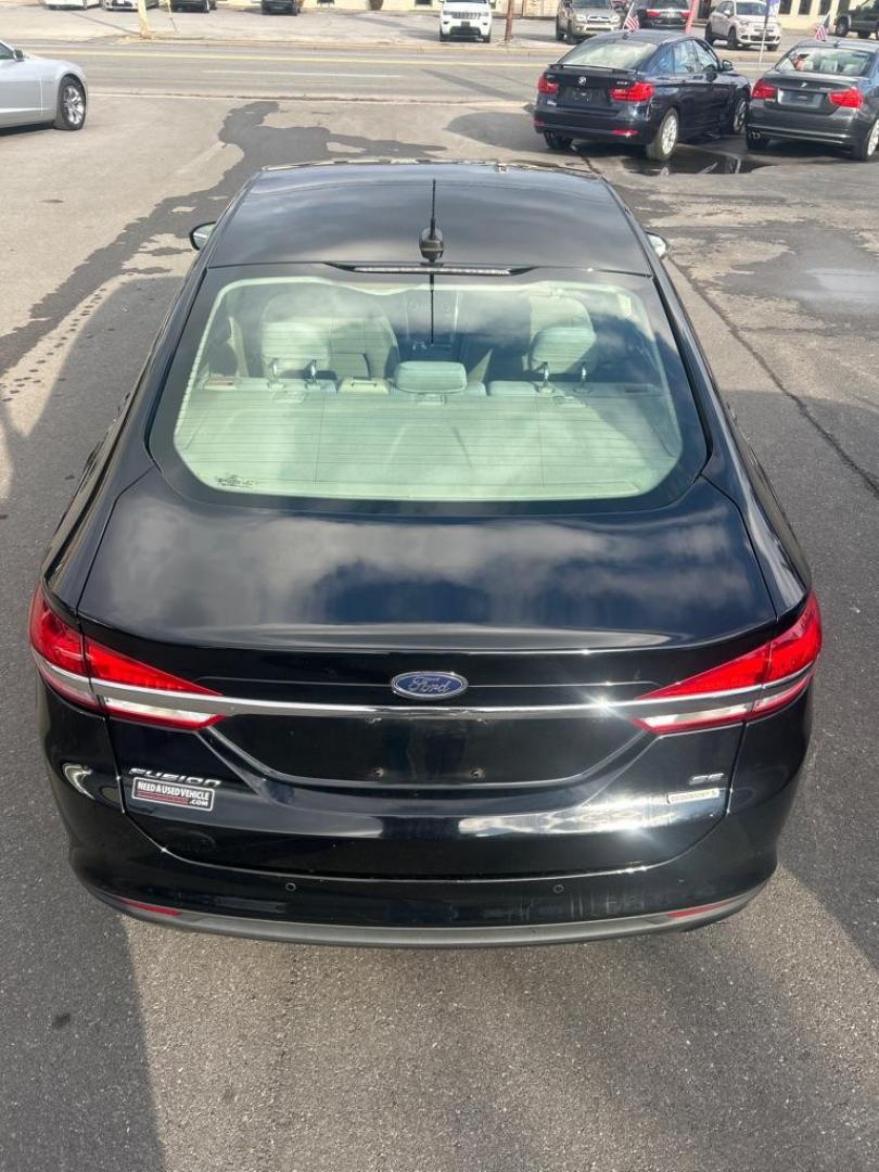 2018 BLACK FORD FUSION SE (3FA6P0HD4JR) with an 1.5L engine, Automatic transmission, located at 2514 Williamson Rd NE, Roanoke, VA, 24012, (540) 265-7770, 37.294636, -79.936249 - NO CREDIT CHECK FINANCING WITH ONLY $2700 DOWN PAYMENT!!!! Check out our website www.needausedvehicle.com for our No Credit Check/ In House Financing options!! No Credit Check Available!!! In House Financing Available!!! All Clean Title Vehicles (no Salvaged or flooded vehicles ever on our lot)! - Photo#11