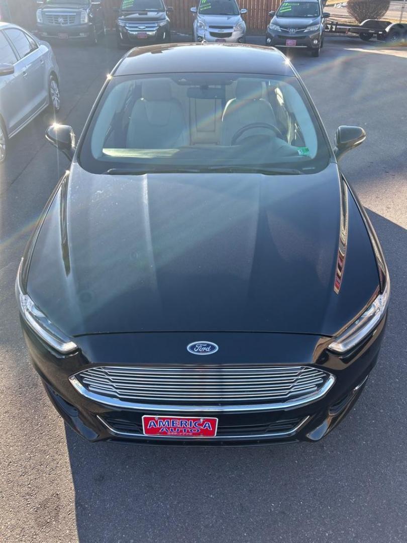 2016 BLACK FORD FUSION TITANIUM (3FA6P0K9XGR) with an 2.0L engine, Automatic transmission, located at 2514 Williamson Rd NE, Roanoke, VA, 24012, (540) 265-7770, 37.294636, -79.936249 - NO CREDIT CHECK FINANCING WITH ONLY $3000 DOWN PAYMENT!!!! Check out our website www.needausedvehicle.com for our No Credit Check/ In House Financing options!! No Credit Check Available!!! In House Financing Available!!! All Clean Title Vehicles (no Salvaged or flooded vehicles ever on our lot)! - Photo#10