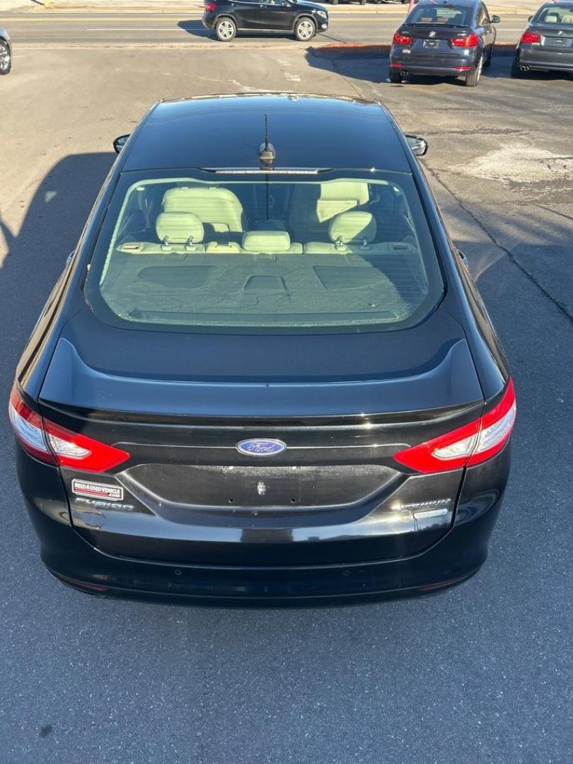 2016 BLACK FORD FUSION TITANIUM (3FA6P0K9XGR) with an 2.0L engine, Automatic transmission, located at 2514 Williamson Rd NE, Roanoke, VA, 24012, (540) 265-7770, 37.294636, -79.936249 - NO CREDIT CHECK FINANCING WITH ONLY $3000 DOWN PAYMENT!!!! Check out our website www.needausedvehicle.com for our No Credit Check/ In House Financing options!! No Credit Check Available!!! In House Financing Available!!! All Clean Title Vehicles (no Salvaged or flooded vehicles ever on our lot)! - Photo#11