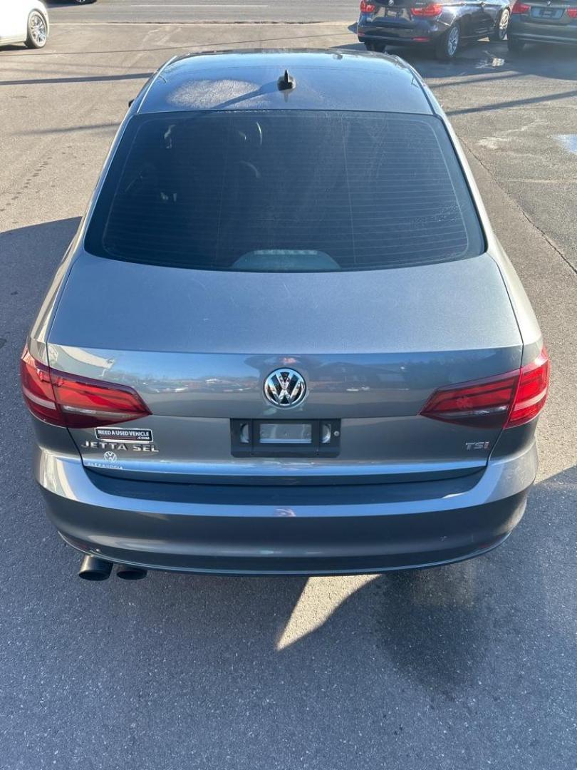 2016 GRAY VOLKSWAGEN JETTA SEL (3VWL17AJ0GM) with an 1.8L engine, Automatic transmission, located at 2514 Williamson Rd NE, Roanoke, VA, 24012, (540) 265-7770, 37.294636, -79.936249 - NO CREDIT CHECK FINANCING WITH ONLY $2300 DOWN PAYMENT!!!! Check out our website www.needausedvehicle.com for our No Credit Check/ In House Financing options!! No Credit Check Available!!! In House Financing Available!!! All Clean Title Vehicles (no Salvaged or flooded vehicles ever on our lot)! - Photo#11